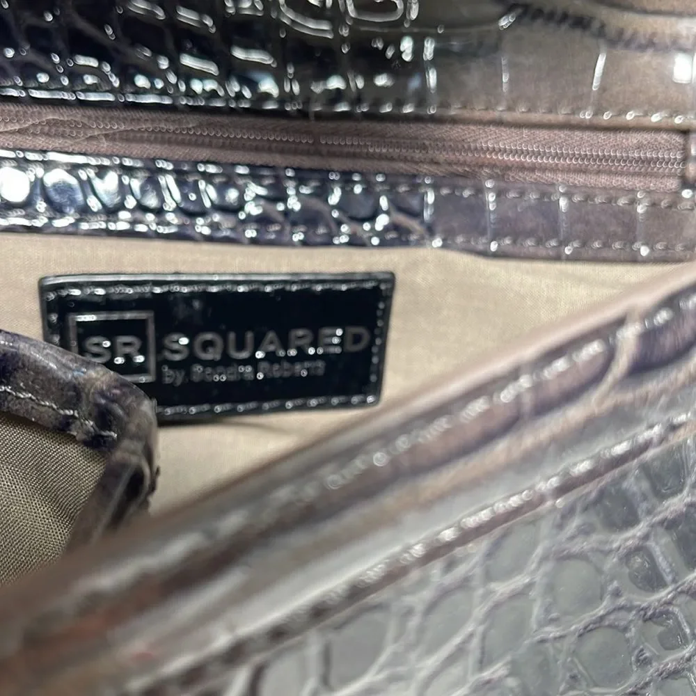 Squared by Sondra Roberts clutch bag.